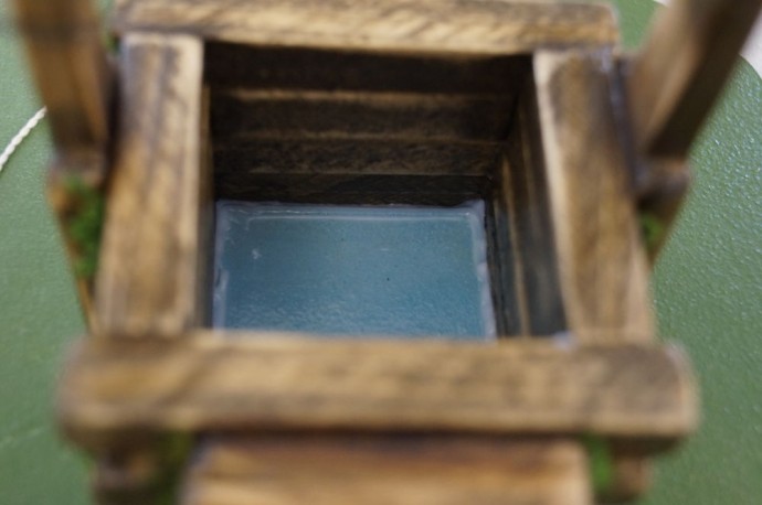 Миниатюрный интерьерный колодец